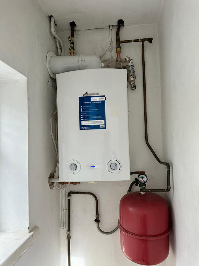 Gas Safe certified boiler setup with clean piping