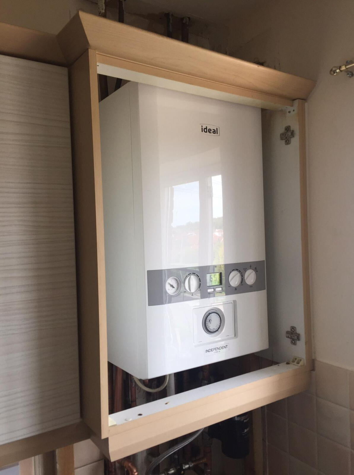 Boiler installation with clean, professionally-installed piping in Stevenage